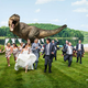 Illustration for article titled Jeff Goldblum Poses for Couples Dinosaur Chase-Themed Wedding Photo